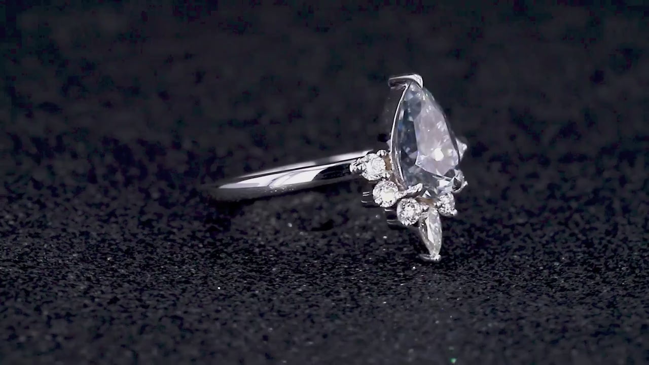 Oval moissanite engagement ring with minimalist band